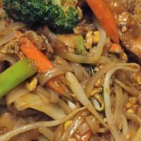 Pad Thai:* (Vg) · Most famous of Thai noodles stir fried with choice of protein,  green onions, bean sprouts, ...