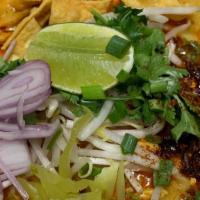 Khao Soi:* (Vg) · Famous Northern-style curry with Choice of Noodle, Soy Curls or Fresh Tofu, shallots, Thai p...