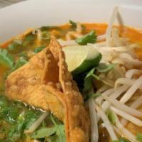Spicy Coconut Noodles:* (Vg) · Rice noodles in spicy coconut milk soup w/choice of protein, bean sprouts, and fresh basil, ...