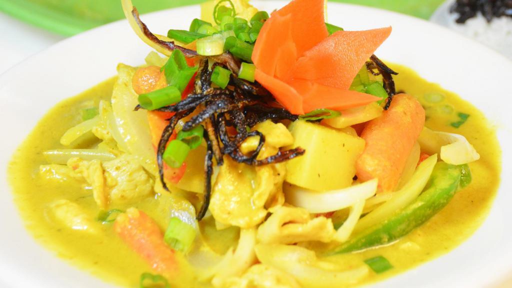 #32 Yellow Curry:* (Vg) · Choice of protein, potatoes, carrots, onions, and bell peppers in a delightful Thai yellow curry.
