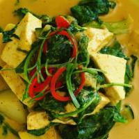 Garden Vegan Curry* · Fresh tofu, zucchini, broccoli, spinach, potatoes, carrots, onions and bell peppers, in a de...