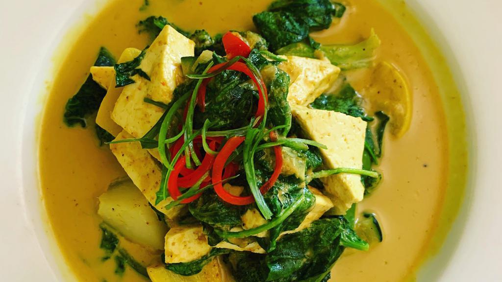 Garden Vegan Curry* · Fresh tofu, zucchini, broccoli, spinach, potatoes, carrots, onions and bell peppers, in a delightful Thai yellow curry.
