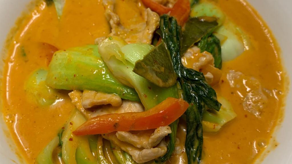 Kang Tae Po (Vg) · Delicious tamarind red curry with choice of protein, Bok Choy, Kaffir lime leave served with jasmine rice.