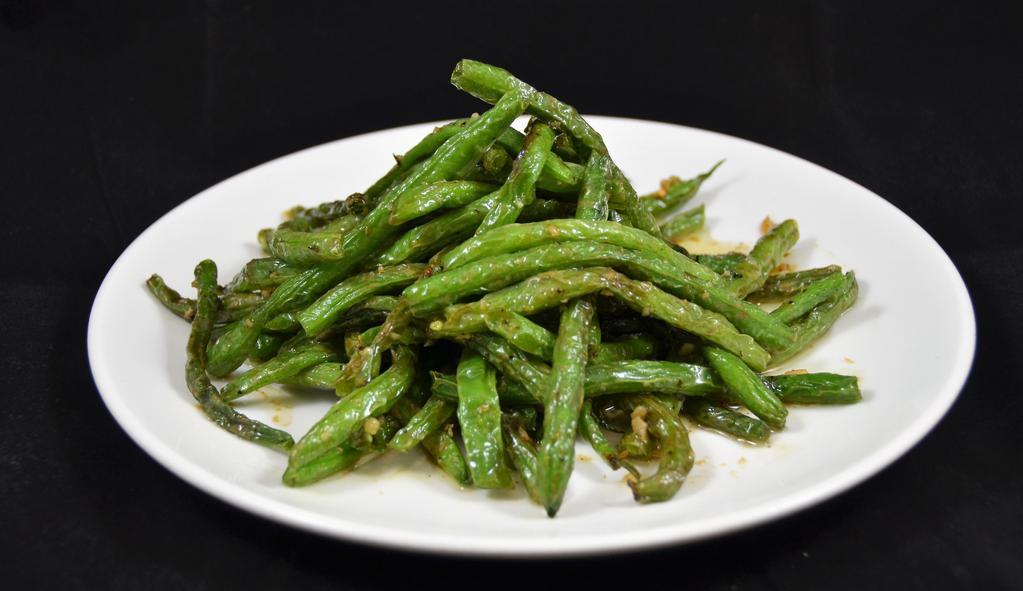 String Beans* (Vg) · Pan fried string beans with fresh garlic and chili in the special house sauce.