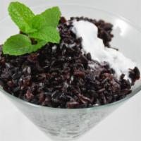 Rice Pudding · Black sticky rice with sweet coconut milk.