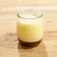 Custard Pudding · Made with: Milk, heavy cream, egg yolk, sugar, brown sugar, water, and gelatin.