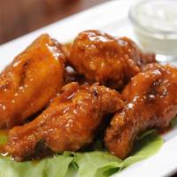 Chicken Wings (6Pcs) · Home Fried Crispy chicken wings. Served with your choice of glaze.
BUFFALO 
BBQ
MANGO HABANE...