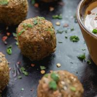 Falafel Appetiser Platter With Pita · 6 Fluffy Falafel Balls Topped With Tahini
Comes with Pita Bread