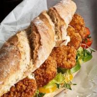 Schnitzel · Fried Breaded Chicken Breast with Veggies and your choice of sauces 
served with a side of F...