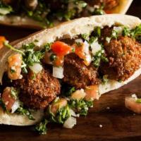 Falafel Sandwich · Delicious Falafel Chickpeas balls 
 served with a side of French fries