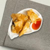 Cream Cheese Wonton (6 Pcs) · Deep-fried wonton wraps filled with cream cheese, carrot, onion, and celery. Served with our...