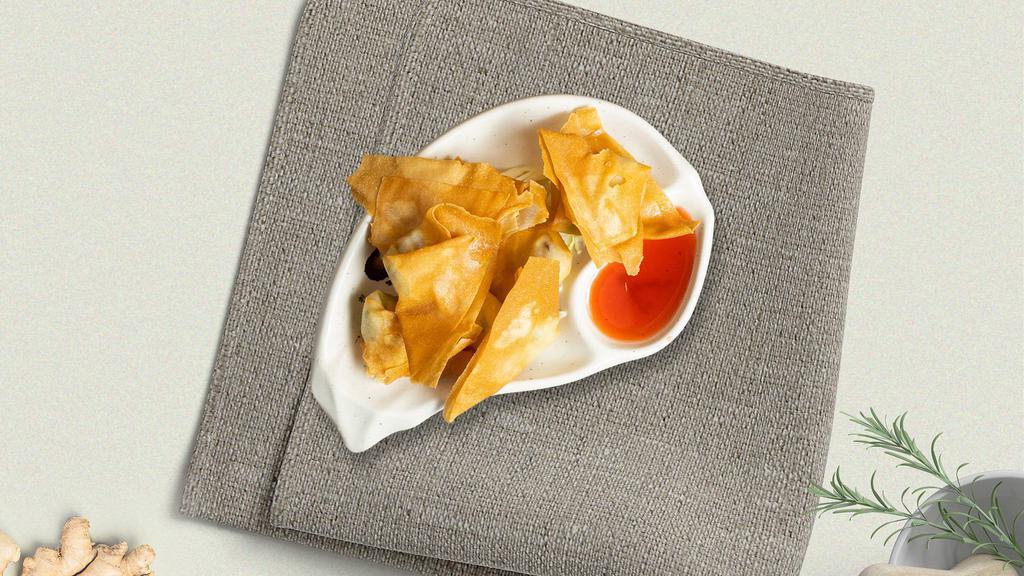 Cream Cheese Wonton (6 Pcs) · Deep-fried wonton wraps filled with cream cheese, carrot, onion, and celery. Served with our house-made sweet-chili sauce.