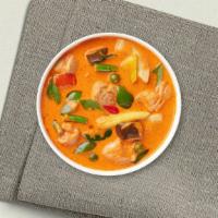 Panang Curry · Eggplant, bell peppers, Thai basil, peas and carrots, and broccoli in mild Panang curry sauc...