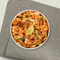Pad Thai (Contains Peanuts) · Pan-fried thin rice noodles, egg, bean sprouts, and green onions in our house-made tamarind ...