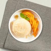 Mango And Sweet Sticky Rice · Sweet sticky rice served with fresh mango and our house-made sweet and salty coconut sauce, ...