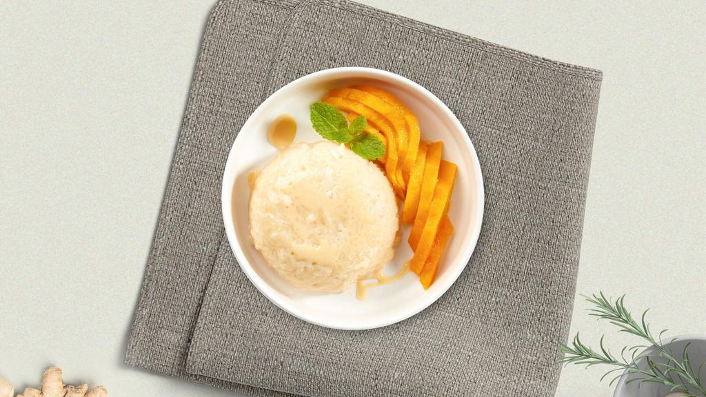 Mango And Sweet Sticky Rice · Sweet sticky rice served with fresh mango and our house-made sweet and salty coconut sauce, and sesame seeds.