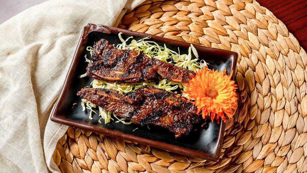 Korean Beef Short Ribs · Served with miso soup, salad, steamed rice.