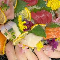Holiday Party Tray Combo B · 5 kind of fish: salmon, tuna yellowtail, super white, red snapper/ albacore
30 pcs nigiri st...