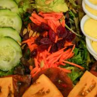 The Bingo Cobb Salad · An updated classic! Mixed greens, craisins, carrots, fresh avocado, boiled egg,  cherry toma...