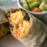 Sausage Burrito · Two scrambled eggs, pork sausage, black beans, home fries, bell peppers, cilantro, cheddar, ...