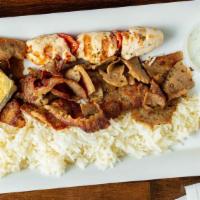 Greek Platter · chicken kabob, gyro, rice, tzatziki, and spanakopita.