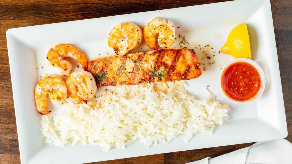 Grilled Shrimp And Salmon · served with rice.