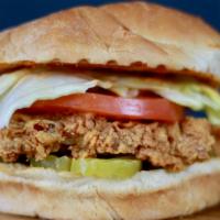 Mamamia Chicken Sandwich · Crispy Fried Chicken, topped with lettuce, tomatoes, pickles, and our special Mamamia sauce