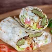 Falafel Deluxe · Falafel wrap filled with fried cauliflower, tomatoes, lettuce, pickles, tahini and feta cheese