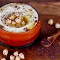 Hummus · Creamy hummus made in-house with garbanzo beans and drizzled with Extra Virgin Olive Oil (8 ...