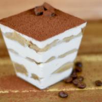 Tiramisu · Elegant layering of Lady Finger cookies, espresso, sweet cream cheese, mascarpone, topped wi...