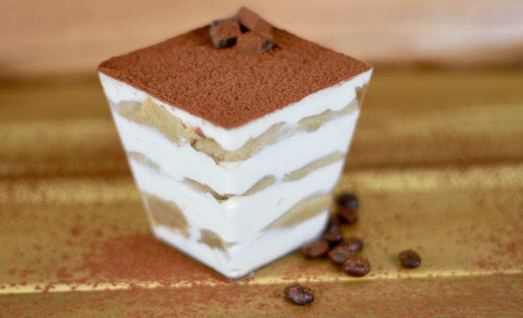 Tiramisu · Elegant layering of Lady Finger cookies, espresso, sweet cream cheese, mascarpone, topped with cocoa powder

*Alcohol Free*