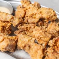 Karaage Chicken · Japanese Fried Chicken Pieces with sweet and spicy haus sauce or dijion mustard.