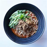 Dandan / 擔擔麵 · Hot. House-made wheat noodle in a heavier chicken broth with sesame paste, topped with mince...
