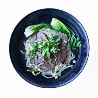 Beef Shank Noodles / 清湯牛肉麵 · House-made wheat noodle in chicken broth, topped with beef shank, bok choy, green onion, and...