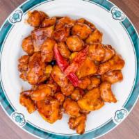 Orange Chicken · Our specially marinated chicken with hints of orange peel & spicy hot peppers