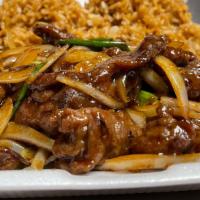 Mongolian Beef · Stir-fried sliced beef with onions in a Mongolian sauce