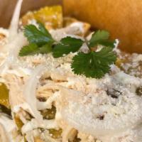 Chilaquiles · Your choice red or green tomato sauce, chicken, cream, onions