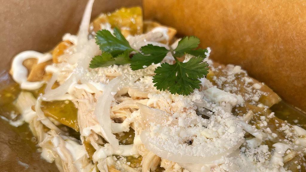 Chilaquiles · Your choice red or green tomato sauce, chicken, cream, onions