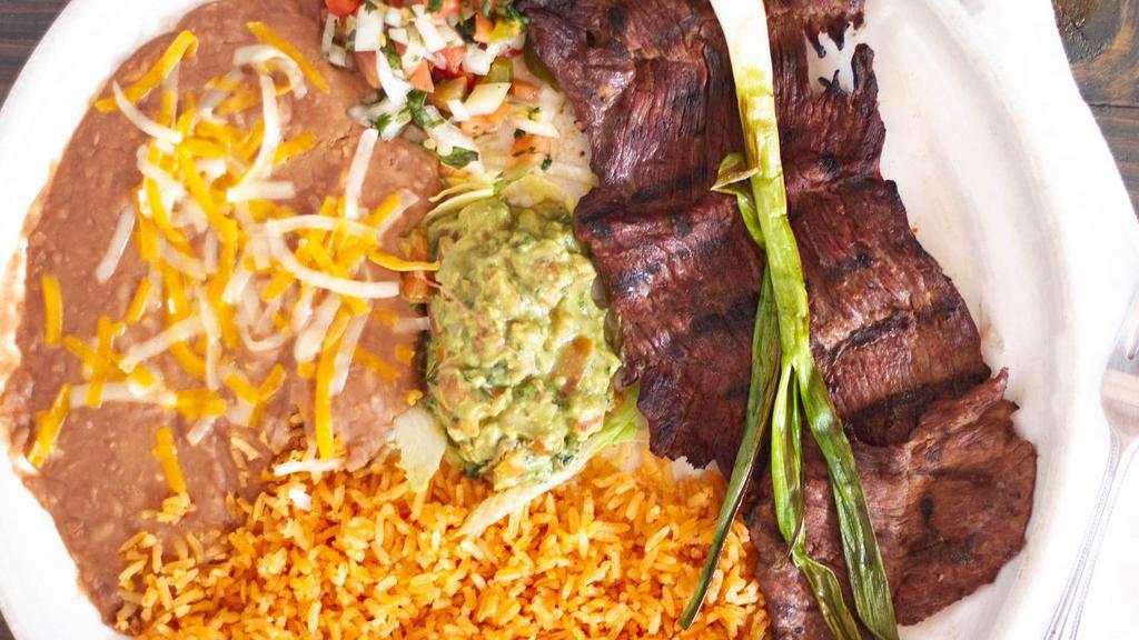Carne Asada With Enchilada Verde · Add guacamole or sour cream for an additional charge.
