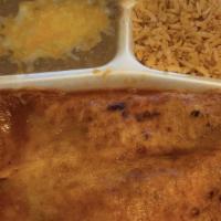 Enchilada Platter · Popular. Two enchiladas with your choice of meat, smothered with a red or green salsa, melte...