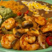 Camarones Mexicanos · Prawns sautéed in garlic, wine and butter with mushrooms, bell peppers, onions, and tomatoes...
