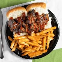 Classic Beef Sandwich · Smoked Beef Brisket topped with our tasty BBQ Sauce. Comes with 2 sides