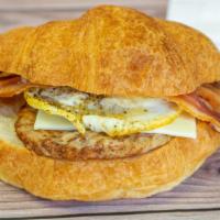 Croissant Sandwich · Ham or sausage patty with bacon egg cheese.