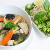 Pho Chay · White rice noodles in clear spices veggie broth, with slim cuts of tofu, mushroom, broccoli,...