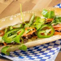 Banh Mi/Sandwich · Protein choice, house-made egg mayo/pate spread, cucumber, cilantro, jalapeños, pickled carr...
