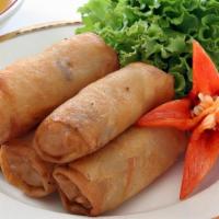 Thai Egg Rolls · Deep-fried mixed vegetable roll served with sweet and sour sauce.