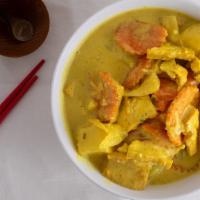 Yellow Curry · Flavored with red chili paste with addition of yellow curry powder, tossed in with potato cu...