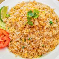 Crab Fried Rice · Fresh dungeness crab meat, onion and egg.