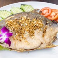 Pompano Fish · Pepper garlic sauce or spicy curry paste or sweet chili sauce.