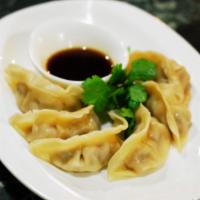 Steam Potsticker · 6 pieces, pork, vegetable, and dipping ginger-soy sauce